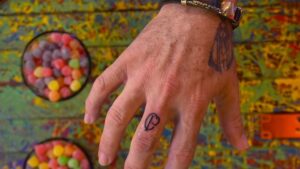Augusto Melo tatua símbolo do Corinthians